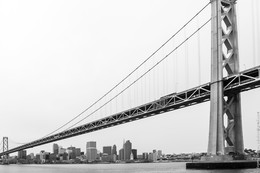 Small San Francisco / Golden Bridge over the distant cityscape.