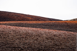 On the Askja volcano / The heels of ash around Askja volcano, Iceland.