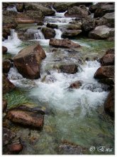 At the waterfall. / ***