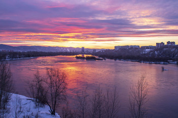 Sunset over a river. / ***
