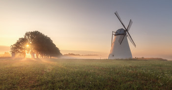 Landscape with an old windmill / Sunrise