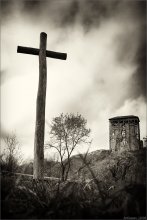 Cross stands tall, holding the clouds ... / ***