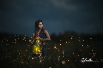 Fireflies / A girl with fireflies.
