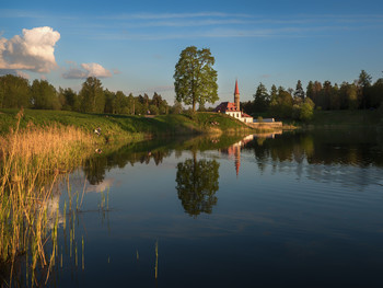 evening landscape with an old Maltese Palace by the lake / Beautiful evening landscape with an old Maltese Palace by the lake. Russia. Gatchina.