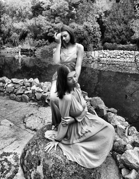 dream / moody image of two young ladies in outdoor scene-a black and white composition