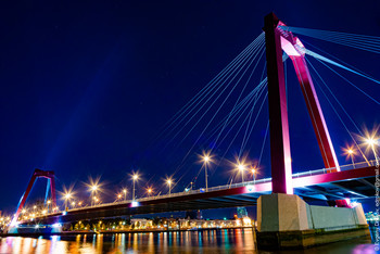 Stars over Willemsbrug / Stars shining in summer night over Willemsbrug in Rotterdam, The Netherlands