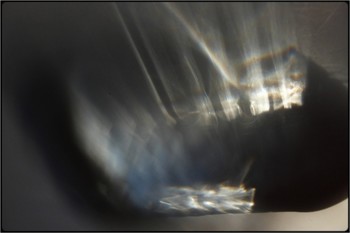ghost in a bottle (1) / light refractions through glass bottle