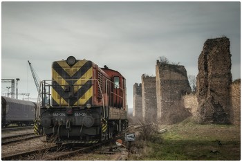 Old Train / Old train shot with Nikon D5600 and 18-105mm lens. Behind the train is Smederevo fortress. Image is edited in Luminar software.