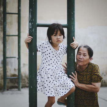 Generations / Vietnameese girl with her grandmother