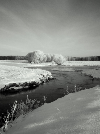 frost and the sun over the river