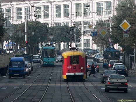 red tram on the street red