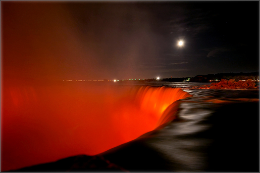 Niagara Falls in a red glow