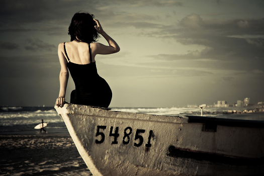 Sitting by the sea, waiting for weather