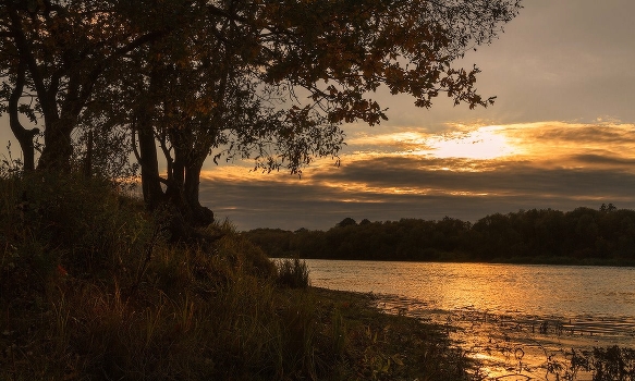 Autumn sunset over the river