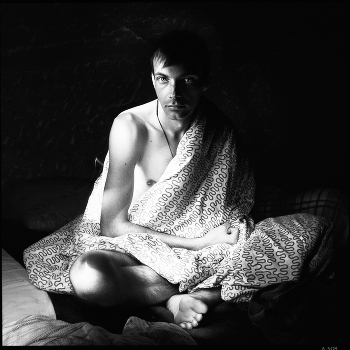 Sergei. Sleepy morning in the hostel.