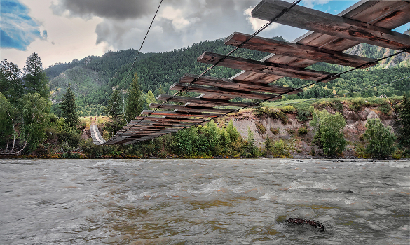 Bridge to the valley of mountain lakes .....