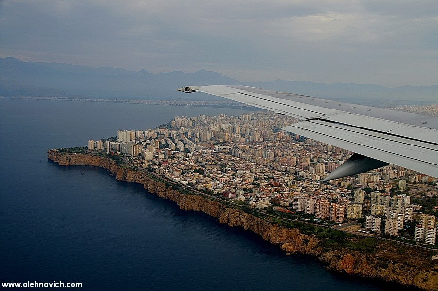 Under the wing of an airplane)))