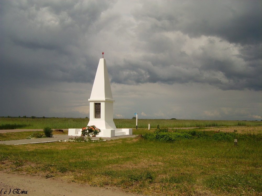 A monument near the road.