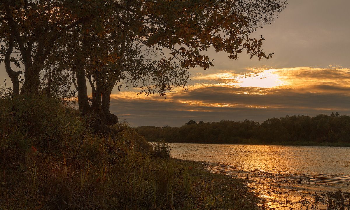 Autumn sunset over the river