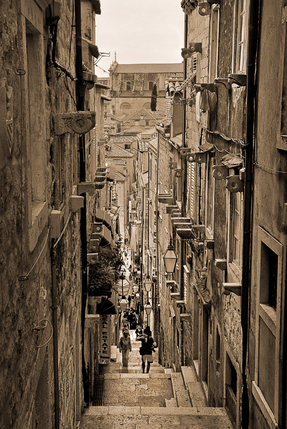 Up the street, running down